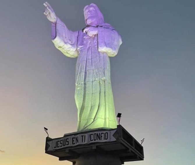 Beautiful view of the Christ of Mercy at sunset