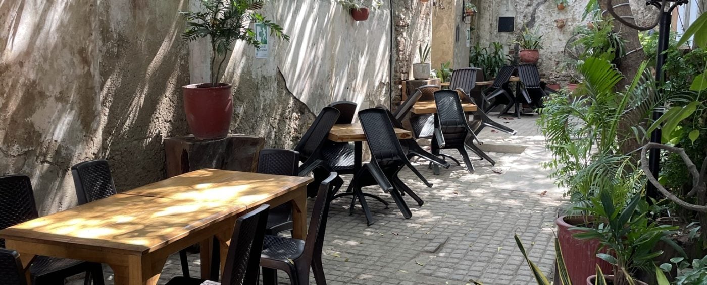 Outside seating area with seats and tables at Di Silvio Italian Restaurant in Cartagena, Columbia