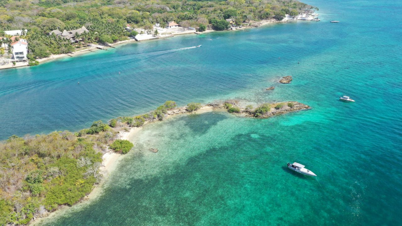aerial view of beautiful island with clear water