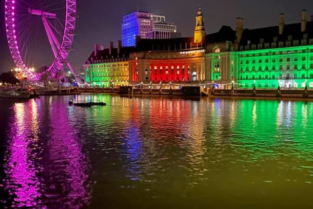 The Thames River at night in front of The London Eye in London, England, United Kingdom