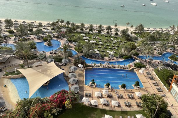 View of the beautiful pools and Arabian Gulf from our balcony at the Westin Resort