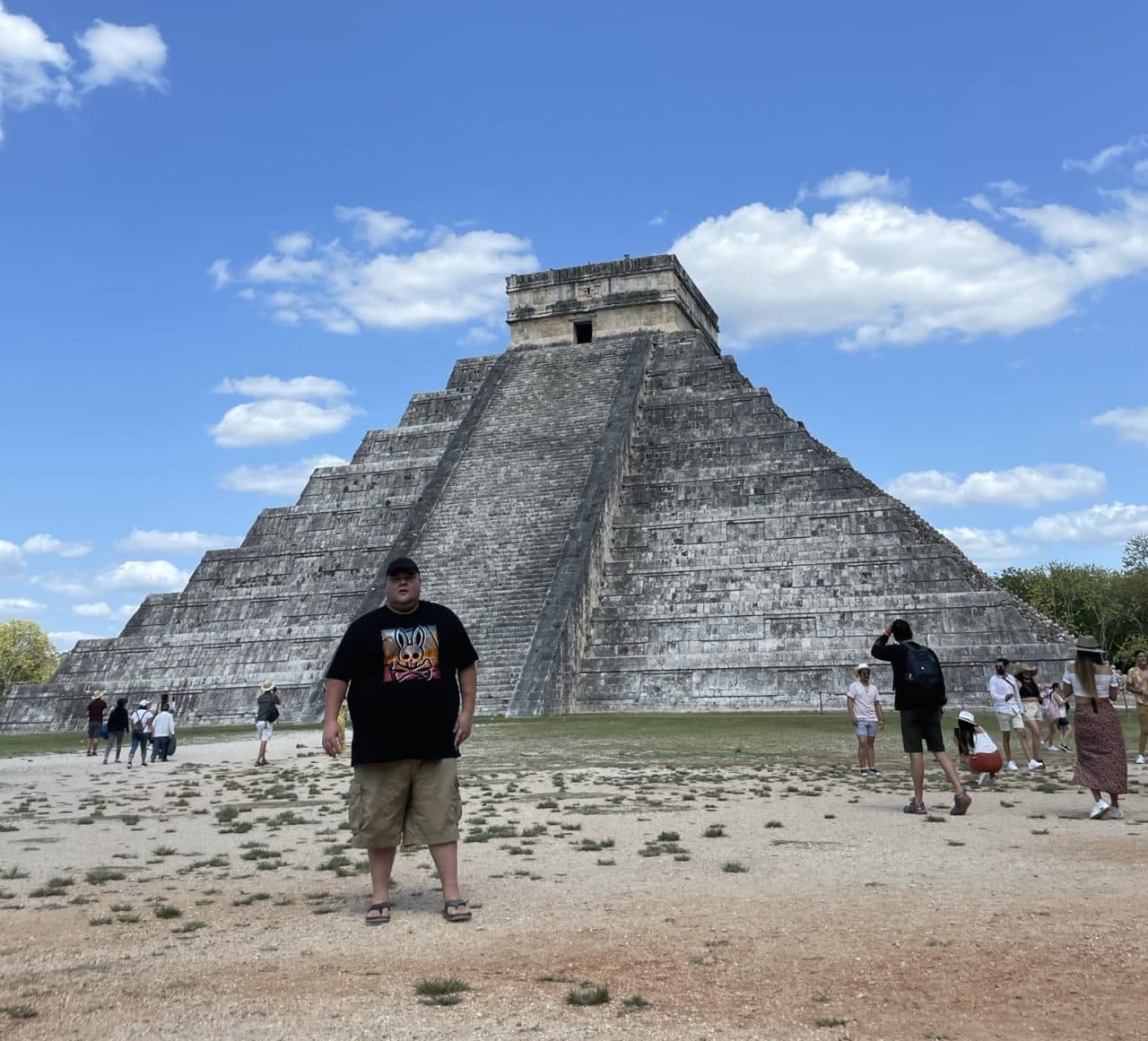 Standing in front of the ancient Mayan temple El Castillo in Chichen Itza located in Mexico