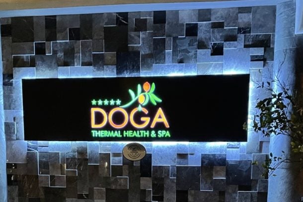 Lit up sign of the Doga Hotel in Turkey