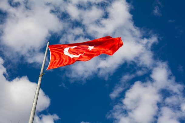 Bright red flag of Turkey blowing in the wind