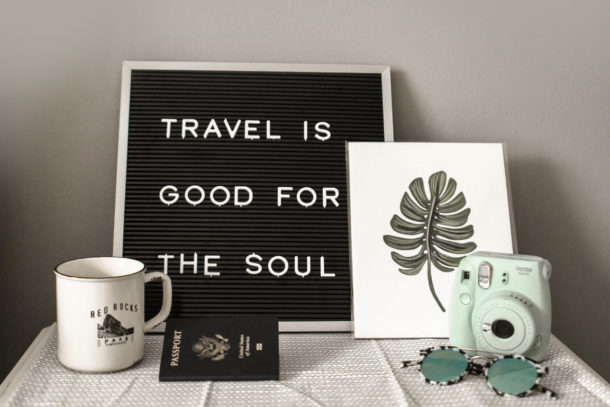 Travel is good for the soul picture with camera and coffee mug