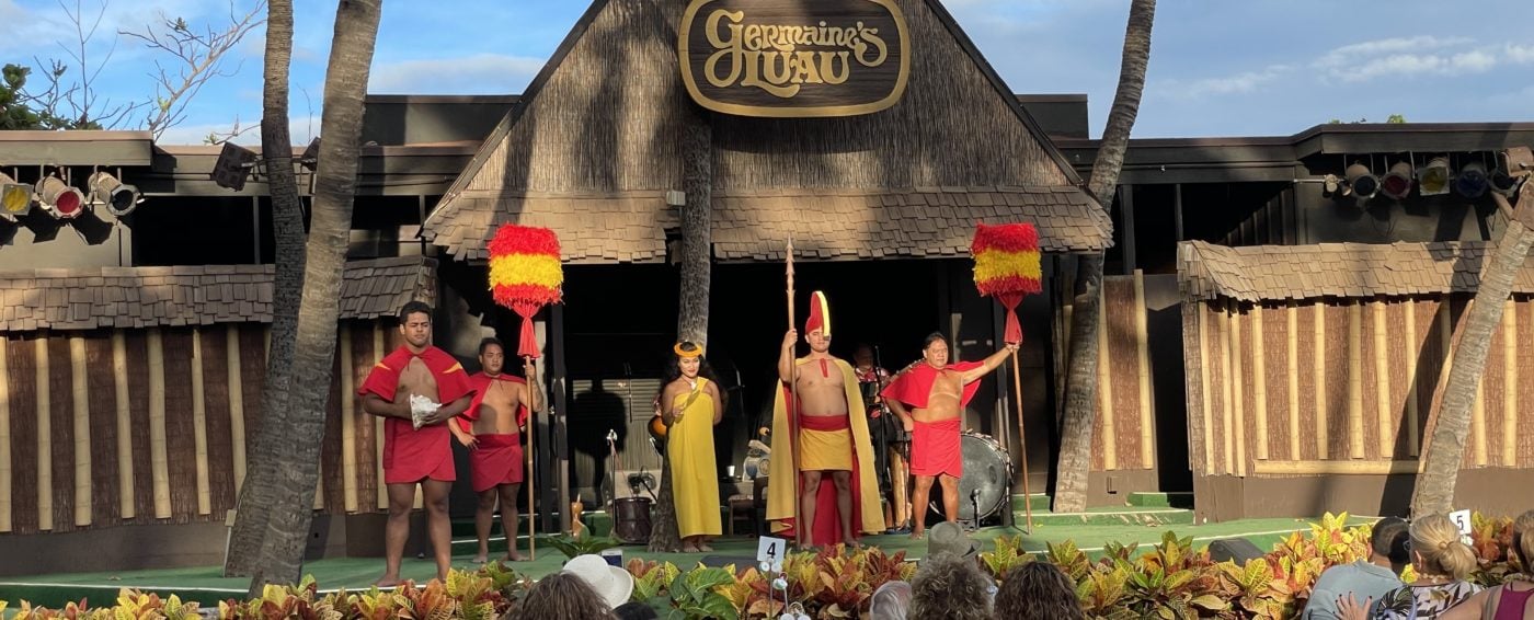 A group watches a luau in Hawaii
