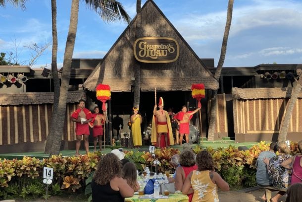 A group watches a luau in Hawaii