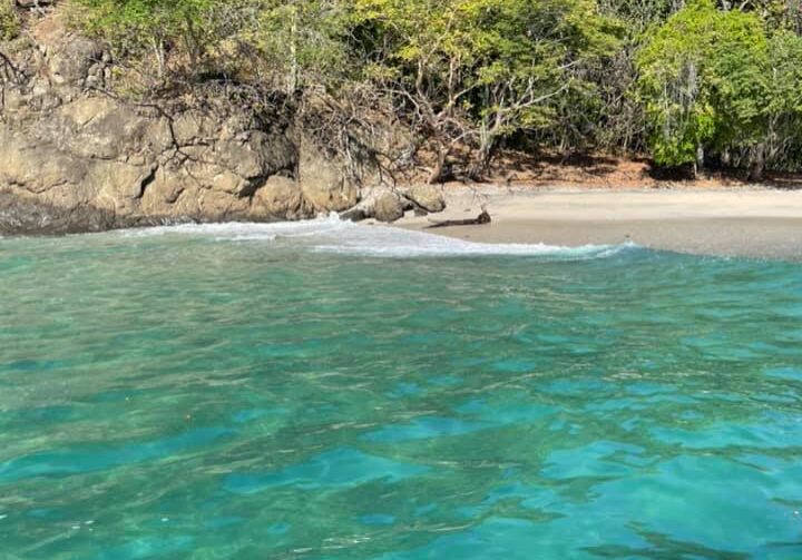 Beach in Costa Rica with beautiful blue water