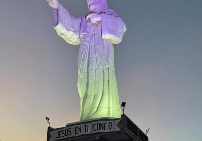 Beautiful view of the Christ of Mercy at sunset