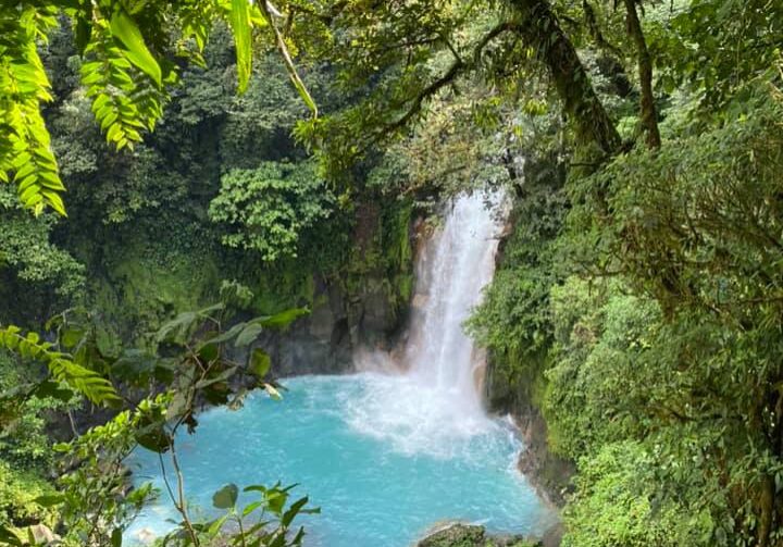 Beautiful blue waterfall in the Tenorio Volcano National Park