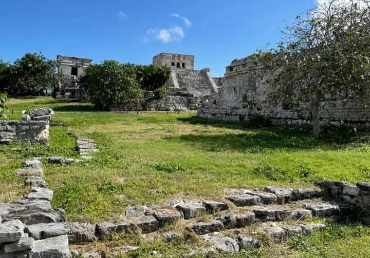 Distant view of El Castillo and surrounding Mayan ruins in Tulum, Mexico